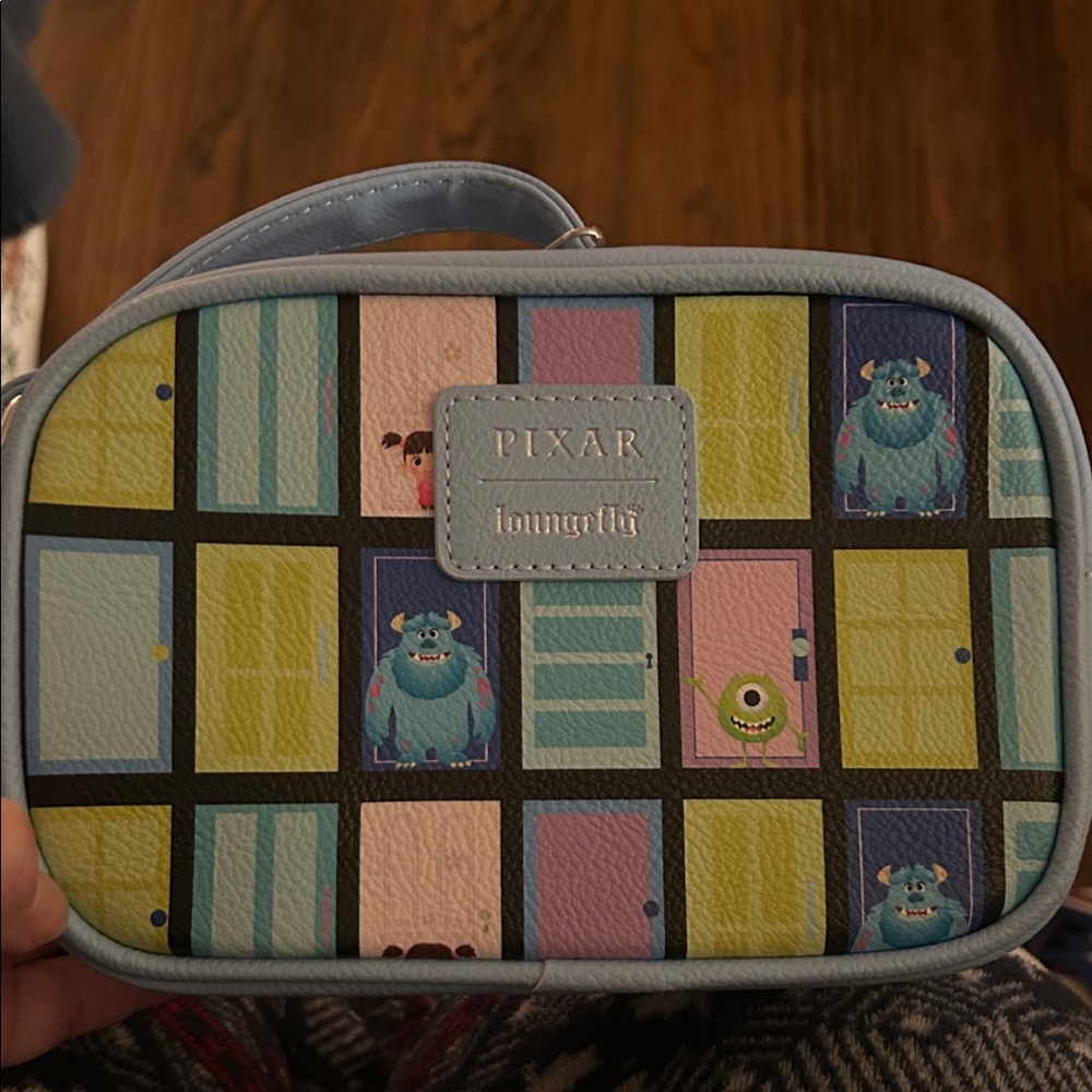 Loungefly Pixar Monsters Inc. Blue and Yellow Mini Bag